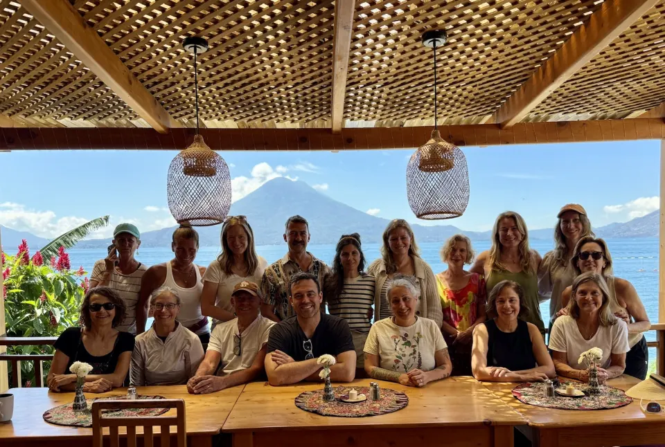 The club at a long table on a retreat in Guatemala